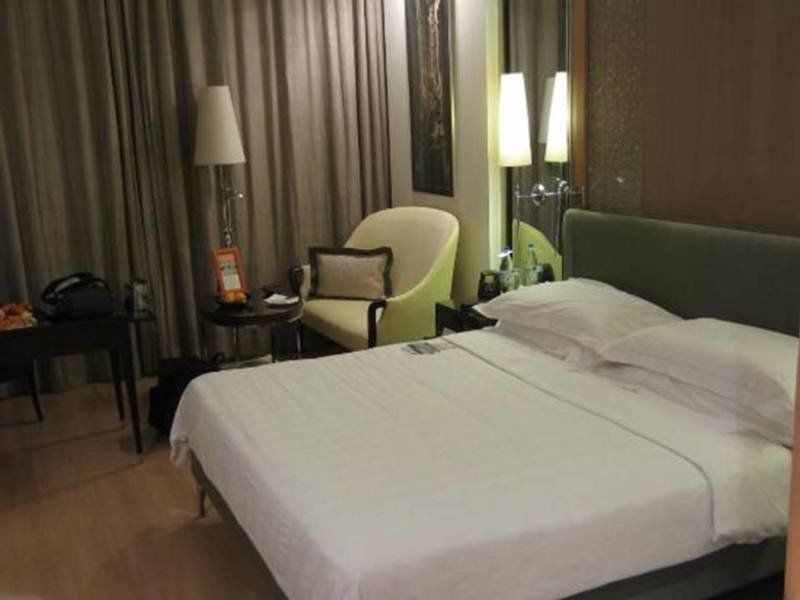 فندق تريدنت غيرغون غورغاون المظهر الخارجي الصورة A room at the hotel